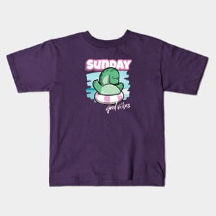 Long Neck Dinosaur floating by the seaside with good vibes on Sunday Kids T-Shirt